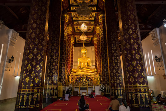 Ayutthaya, Thailand - June, 22, 2020 : Golden buddha image in ancient temple in Ayutthaya , Thailand