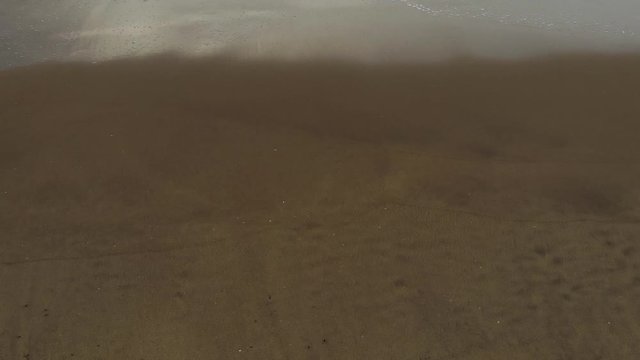 Drone Footage of Ocean waves in a small Indian Village 