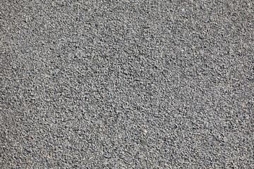 abstract background of gray construction stone pebbles