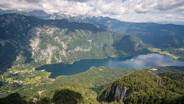 birds view of lake Bohinj in Slovenia. view from the top of Vogel mountain with the julian alps in the background