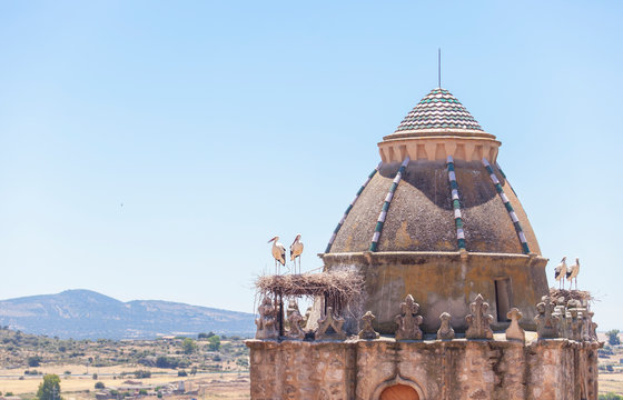 Alfiler tower, Gothic belfry adorned with glazed roof tiles, Trujillo, Spain