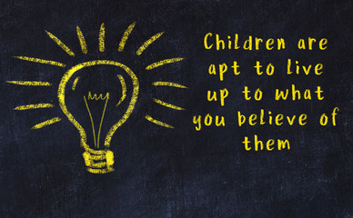 Chalk drawing of a bulb and inscription of wise quote