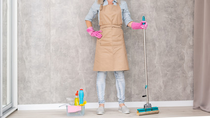 Portrait Of Happy Woman Cleaning the apartment