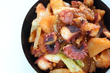 Korean food, octopus and potato stir fried with cabbage