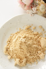 Japanese food ingredient, soy powder on dish with copy space