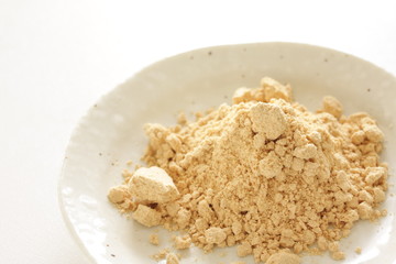 Japanese food ingredient, soy powder on dish with copy space