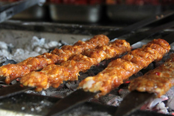delicious Adana kebab and salads