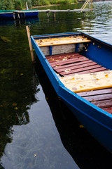 Moored boats in the autumn lake