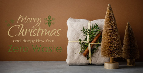 Fabric wrapped gifts, Zero waste beauty body care and house cleaning items and wooden Christmas decorations
