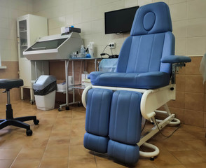 blue medical chair and equipment in the ENT doctor's office