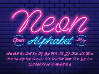 Obraz na płótnie Canvas Glowing neon light alphabet design with uppercase, lowercase, numbers and symbols