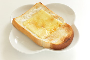 Fototapeta na wymiar sliced cheese and sugar on toast for asian broakfast