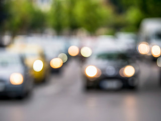 Out of focus car traffic. Bokeh blurred car lights.