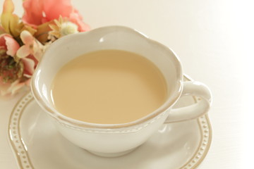 tea cup and flower on white background