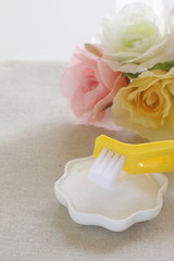 sodium bicarbonate and brush for house keeping
