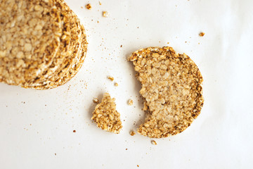 Crunchy and airy loaves on a white background, diet crunchy round rice waffles.