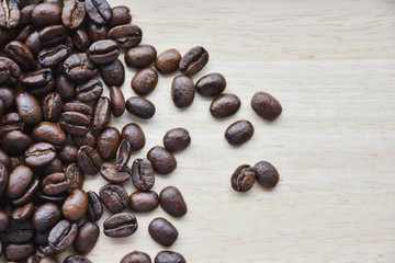 coffee beans on wooden background