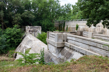 Fototapeta na wymiar Ruins of the Old Dam at Dellwood Park in Lockport Illinois during the Summer