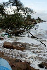 mucuri, bahia / brazil - august 25, 2009: containment made of a sandbag to prevent the sea from...