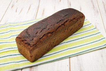 A loaf of black yeast-free bread.