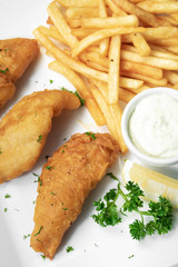 british traditional fish and chips meal on plate