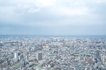 Naklejka premium Tokyo, Japan - Mar 28, 2019:Asia business concept for real estate and corporate construction - panoramic modern city skyline aerial view of Ikebukuro in tokyo, Japan