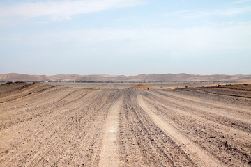 Fototapeta na wymiar Unpaved road in the Namib desert, Namibia