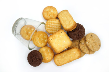 Various butter cracker pile isolated on white background