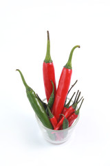 Red Chilies Over White Background
