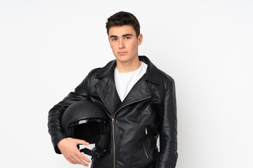 Man holding a motorcycle helmet isolated on white background sad