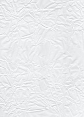 Vertical texture of crumpled paper. Substrate for poster.