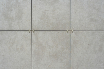 Fragment of a ventilated facade made of ceramic tile