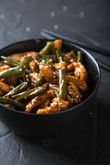 Fried green beans with chicken fillet in teriyaki sauce