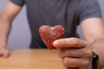 person holding heart