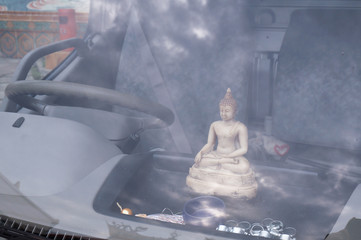 27 August 2014, Singapore: Buddha Statue On Car Dashboard at Singapore.