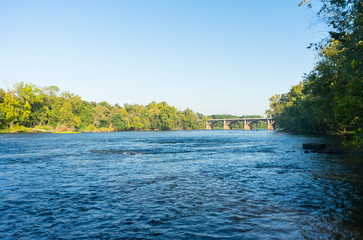 River view with bridge in the distance, Columbia, SC.