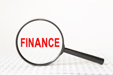 words in a magnifying glass on a white background. business concept