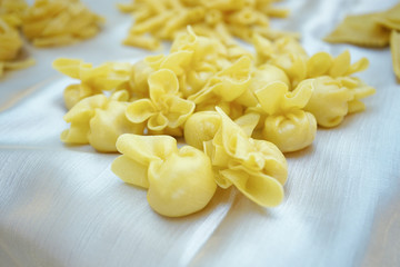 Italian traditional tortellini pasta over white background Healthy diet. Mediterranean cuisine.
