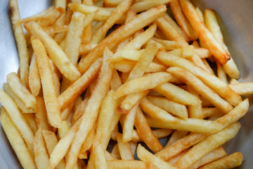Close up french fries in bowl.