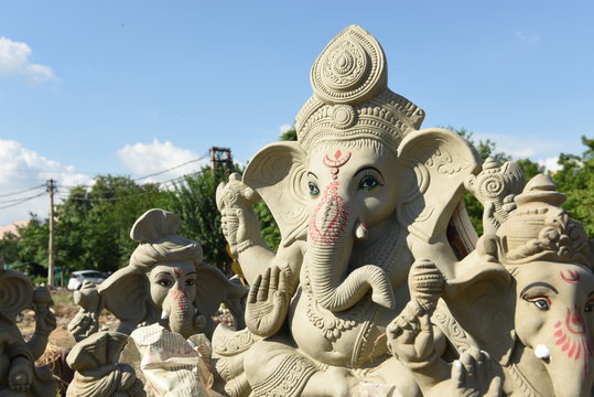 Clay statue of Indian God Ganesha being displayed on the occasion of Ganesh Chaturthi festival