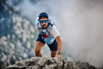 Portrait of man ultramarathon runner in action