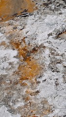 Abstract Orange, White, and Gray Natural Rocky Spring