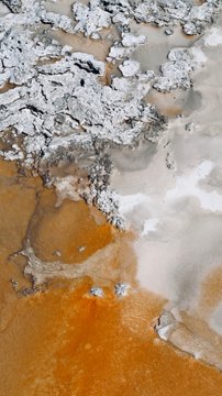 Abstract Orange and White Natural Spring with Gray Rocks
