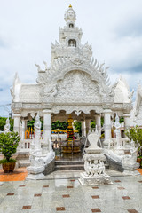 NAN ,THAILAND - 2020 AUGUST 05 : Ming Muang Temple is well-known for white-grey architectures around the whole area. The ubosot is the most beautiful, as its Lanna contemporary style.
