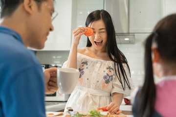 Family having breakfast at home. Happy lifestyle family moments.
