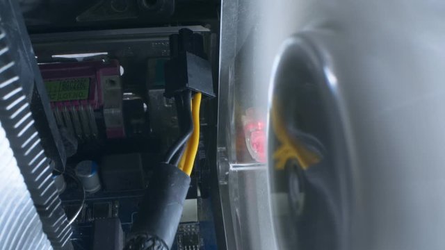super close up, details. view inside the system unit, a working computer cooler