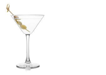Vodka martini gin cocktail in classic glass with olives on bamboo stick on white background with reflection.