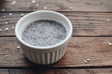 Chia pudding close up, Chia pudding plain on the wooden background.