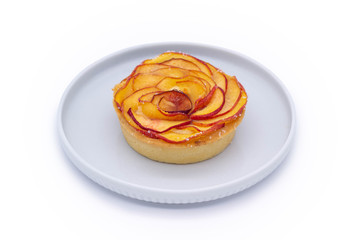 Fruit tart with apples on a white background