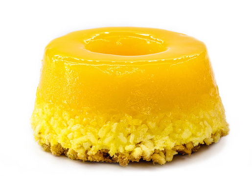 egg yolk candy, called Quindim in Brazil, and Portugal in brisa-do-Lis. isolated white background